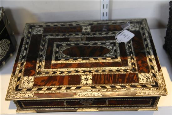 An 18th century Indo-Portuguese ivory, ebony and tortoiseshell games box, width 15.25in.